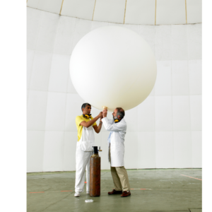 Picture of Two People Holding a Weather Balloon